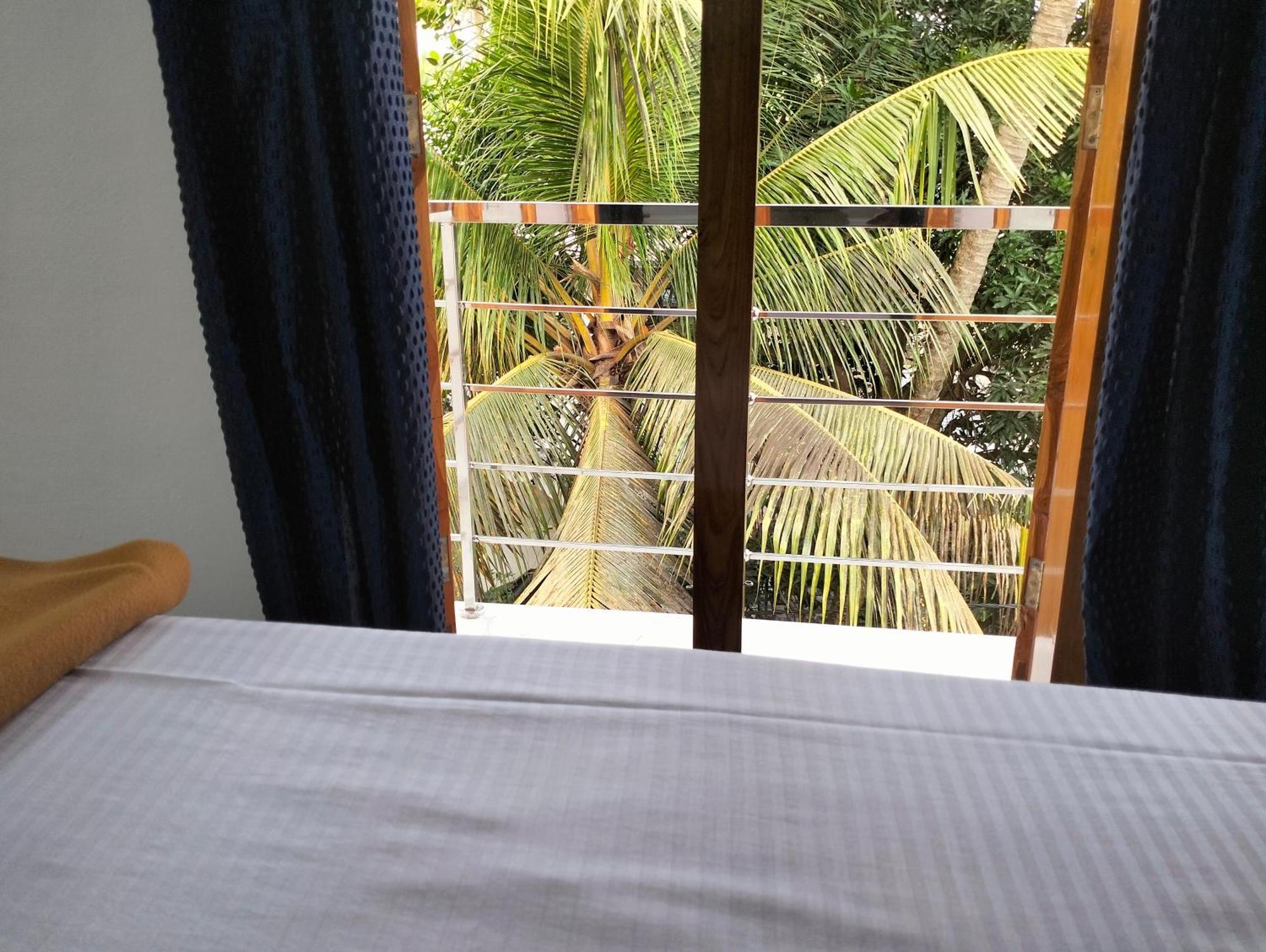 Guestland Homestay Kochi ภายนอก รูปภาพ